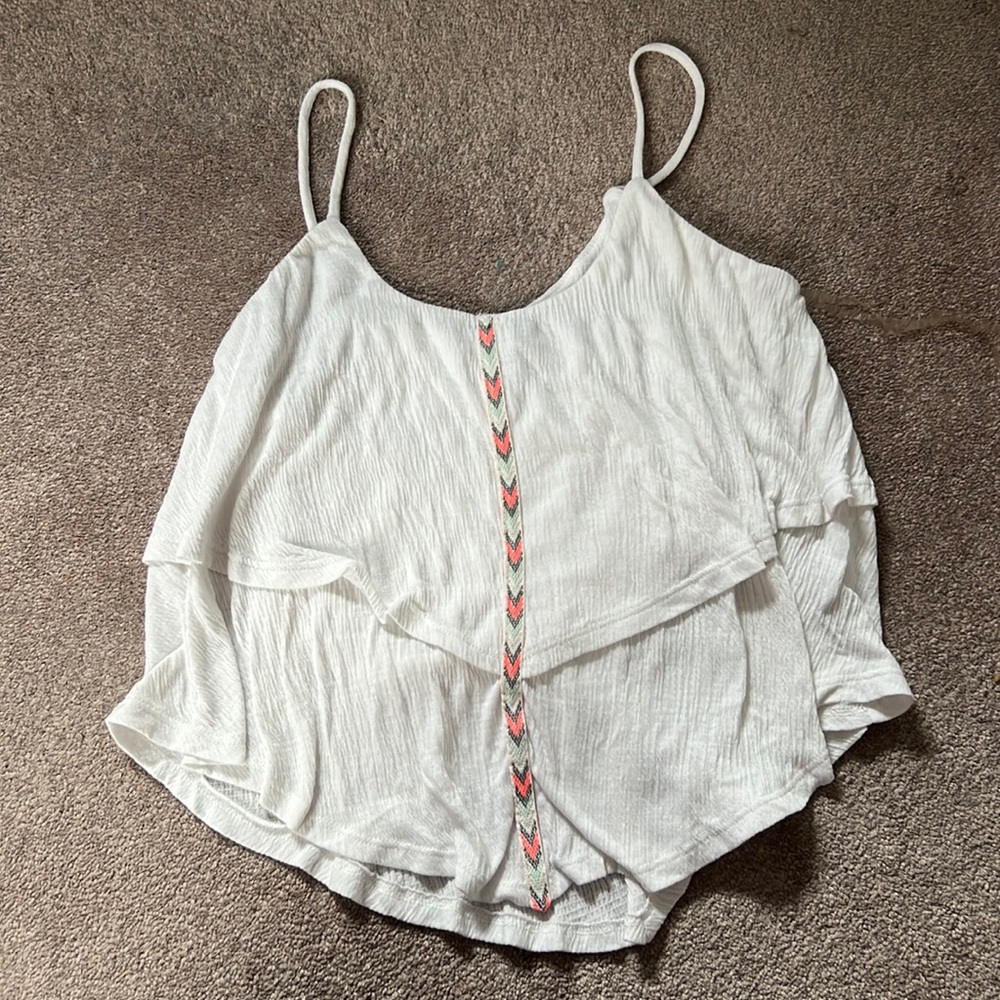 White layered top with chevron detail